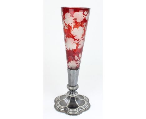 Late C19th Bohemian glass trumpet vase, the ruby glass flash cut engraved with fruit and vine decoration, set in English Walk