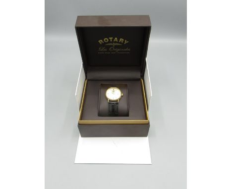 Rotary Gold Quartz Wristwatch with date signed two tone sunray dial with applied baton hour markers two piece case on origina