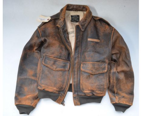 Avirex Type A-2 reproduction USAAF aircrew jacket "The Memphis Belle Home At Last" artwork to rear, size M. Some tears to inn