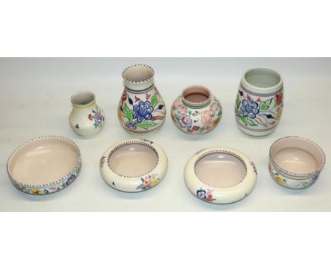 Collection of mid C20th Poole Pottery with painted decoration including four vases, max. H14cm, rose bowls, etc. (8) 