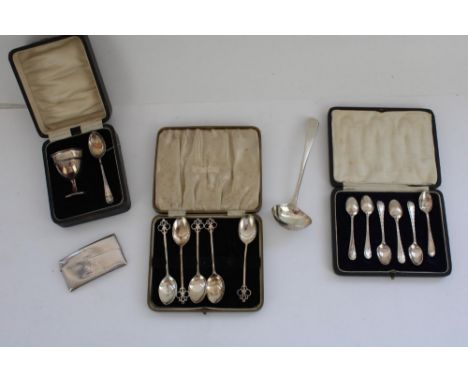 Hallmarked silver card case, ladle, egg and spoon set, six coffee spoon set and one other coffee spoon set (missing single sp