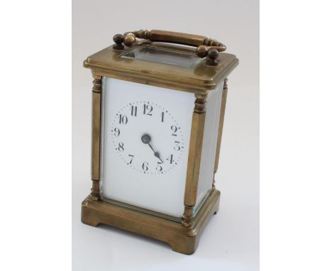 C20th French brass cased carriage clock timepiece, white enamel dial (lacking minute hand) visible cyclinder escapement, back
