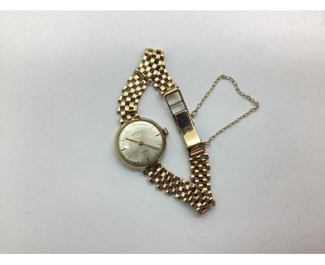 Rotary; A 9ct Gold Cased Ladies Wristwatch, the signed dial with line markers, within plain case, to integral bracelet with 9