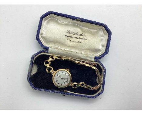 Rotary; A 9ct Gold Cased Ladies Wristwatch, to integral geometric link and part expanding bracelet, stamped "9ct", in a fitte