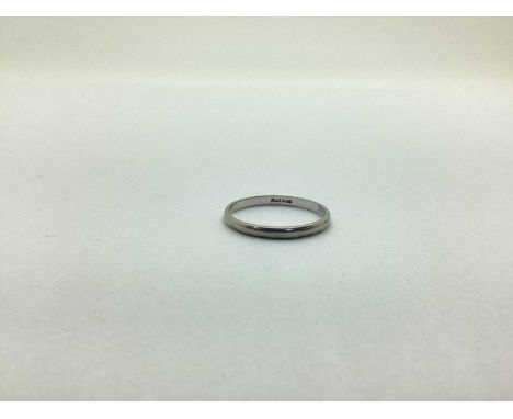 A Dainty Plain Band, Stamped "PLATINUM" (finger size R) (2.5grams).