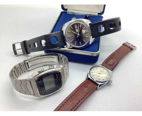 Timex; A 1970's 'Q' Gent's Wristwatch, the signed smokey dial with line markers, centre seconds and day/date aperture, the ca