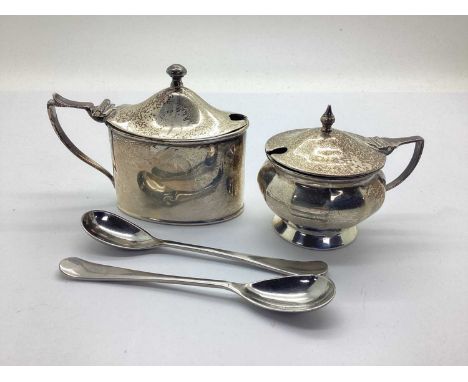Two Hallmarked Silver Lidded Mustards, each with blue glass liner (damages) and two stainless steel mustard spoons,