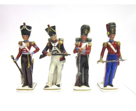 FOUR SITZENDORF PORCELAIN SOLDIER FIGURINES comprising a Grenadier Guard, 1853; Royal Irish Fusiliers Drum Major, 1828; Light