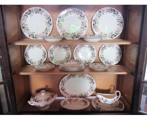 A WEDGWOOD 'HATHAWAY ROSE' PATTERN PART DINNER SERVICE comprising six soup bowls, five dinner plates, five side plates, six t