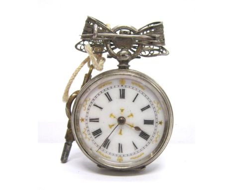 A LADY'S FOB WATCH the enamel dial with black hands and Roman numerals, the four piece hinged silver coloured case housing a 