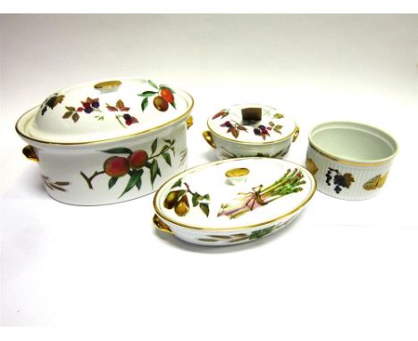 FOUR PIECES OF ROYAL WORCESTER 'EVESHAM' PATTERN TABLEWARE comprising a deep oval casserole dish and cover; an oval tureen an