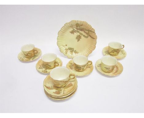 A ROYAL WORCESTER PART TEA SERVICE blush ivory with gilt decoration, comprising six cups, ten saucers, and a sandwich plate.