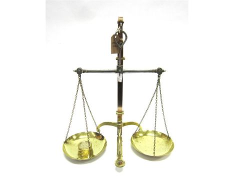 A PAIR OF BRASS BANK SCALES By 'Degrave short Fanner & Co' with '£5 silver' brass weight