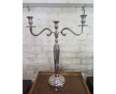 A single plated three light candelabrum 