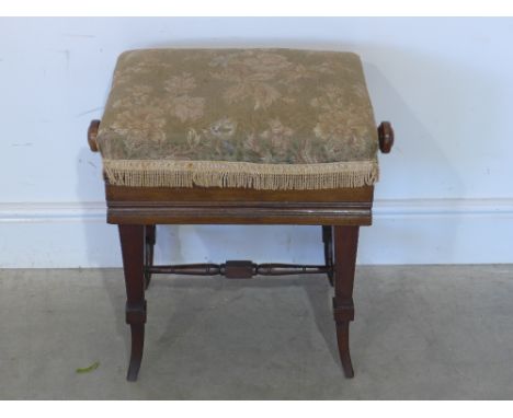 An Edwardian mahogany rising piano stool - stamped Brooks Ltd. London to underside 