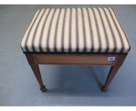 An Edwardian inlaid mahogany music stool on square tapering legs and spade feet - Height 47 cm x 49 cm x 49 cm 