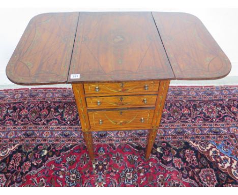 A very good quality Edwardian satinwood Pembroke work table the top decorated with a central cartouche with a posy of flowers