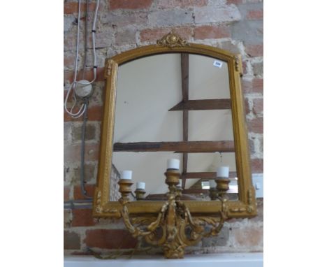 A gilt framed wall mirror with three branch light fittings below, foliate design surround - 90 cm x 54 cm 