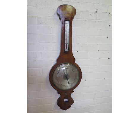 A 19th century mahogany wheel barometer 10" silvered dial with thermometer above - Height 1 m
Condition report: Working - plu