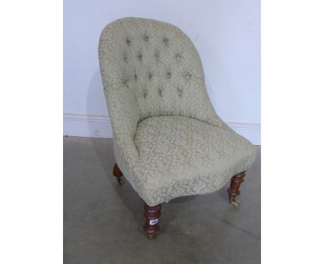 A 19th century mahogany framed button back nursing chair 