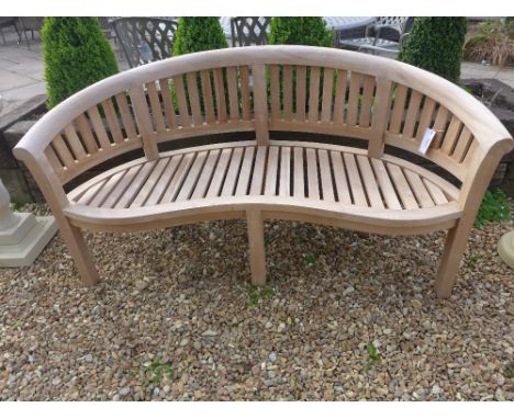 A teak banana bench