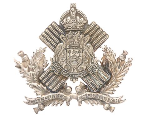 Badge. Indian Army. Calcutta Scottish Officer's glengarry badge.  Good scarce silvered crowned saltire bearing Arms of Calcut