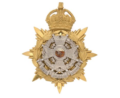 Badge. Border Regiment Officer's helmet plate circa 1901-14.  Fine scarce gilt crowned star mounted with silver Bath cross wi