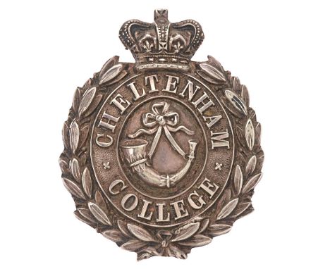 Badge. Cheltenham College Victorian shako badge.  Good scarce die-stamped silvered crowned oval CHELENHAM COLLEGE resting in 