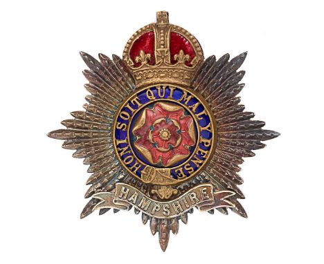 Badge. Hampshire Regiment Officer's cap badge circa 1901-46.  Fine scarce die-cast unmarked silver star mounted with pierced 