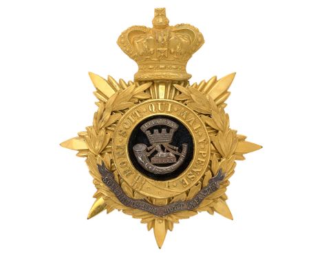 Badge. Somersetshire Light Infantry Victorian Officer's helmet plate circa 1881-1901.  Fine gilt crowned star mounted with Ga