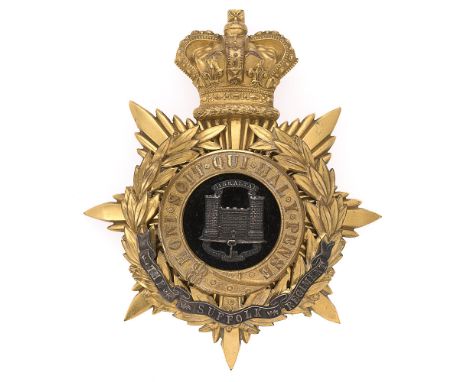 Badge. Suffolk Regiment Victorian Officer's helmet plate circa 1881-1901.  Fine gilt crowned star mounted with Garter and lau