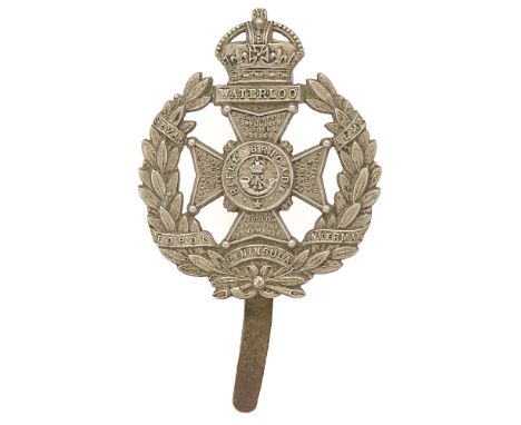 Badge. Rifle Brigade Edwardian cap badge circa 1903-10.   Good scarce die-stamped white metal crowned WATERLOO tablet on Malt