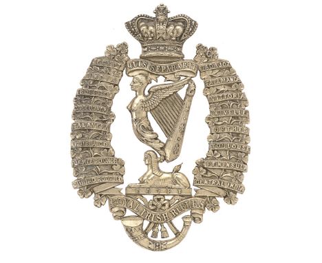 Badge. Royal Irish Rifles Victorian Officer's helmet plate circa 1881-90.  Fine die-stamped silvered white metal crown on QUI