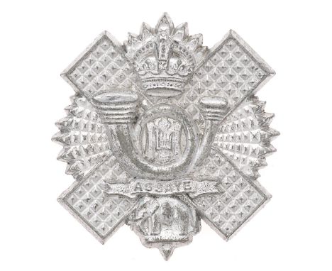 Badge. Scottish. Highland Light Infantry WW2 plastic economy HLI glengarry badge  Good scarce Thistle star bearing crown, coi