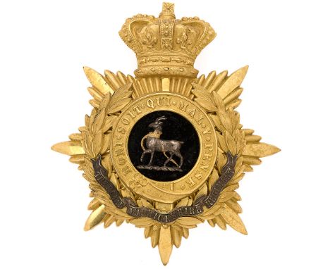 Badge. Royal Warwickshire Regiment Victorian Officer's helmet plate circa 1881-1901.  Fine gilt crowned star mounted with Gar