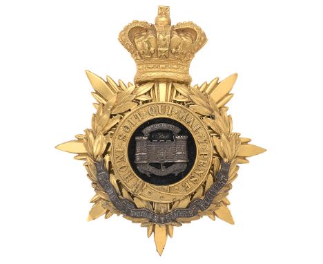 Badge. Dorsetshire Regiment Victorian Officer's helmet plate circa 1881-1901.  Fine rich gilt crowned star mounted with Garte