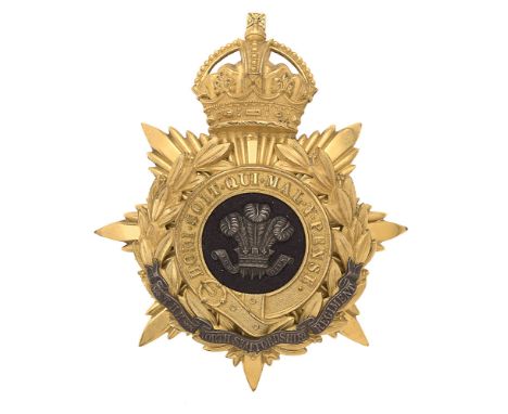 Badge. North Staffordshire Regiment Officer's helmet plate circa 1901-14.  Fine gilt crowned star mounted with Garter and lau