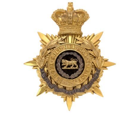 Badge. Hampshire Regiment Victorian Officer's helmet plate circa 1881-1901.  Fine rich gilt crowned star mounted with Garter 