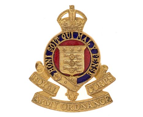 Badge. Royal Army Ordnance Corps Officer's cap badge circa 1920-47.  Fine die-stamped gilt crowned blue enamel backed pierced