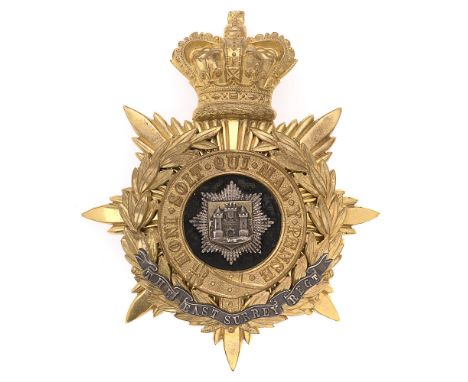 Badge. East Surrey Regiment Victorian Officer's helmet plate circa 1881-91.  Fine gilt crowned star mounted with Garter and l