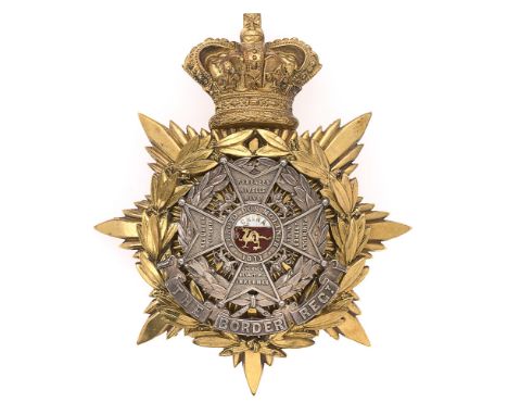 Badge. Border Regiment Victorian Officer's helmet plate circa 1891-1901.  Fine scarce gilt crowned star mounted with silver B