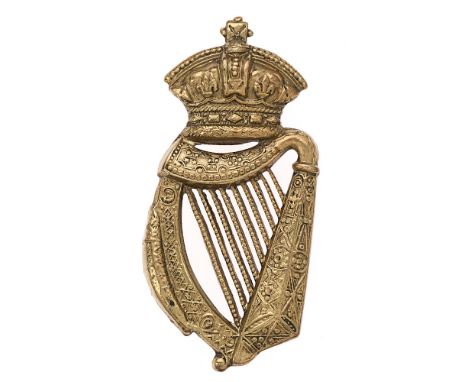 Badge. Royal Irish Reserve Regiment Boer War cap badge circa 1900-01.  Goods scarce die-stamped brass Imperial crowned Harp. 