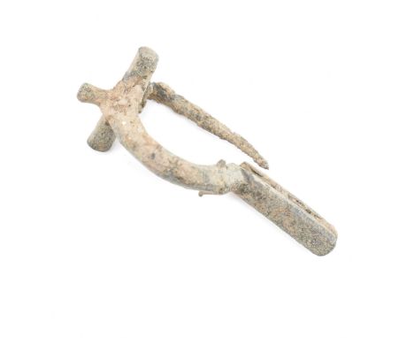 Antiquities - A roman fibula crossbow brooch of P form having a straight pin. Measures approx 4.7cm wide.
Please Note: From a