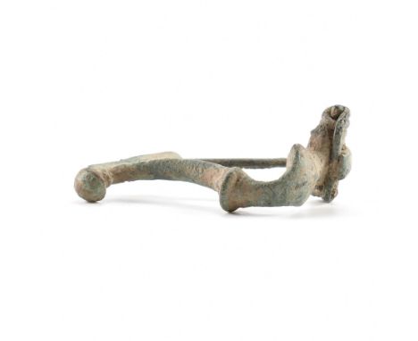 Antiquities - A&nbsp; roman fibula crossbow / trumpet brooch having a straight pin and spring coil. Measures approx 4.5cm wid