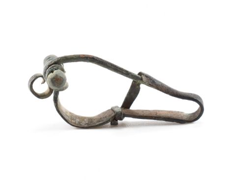 Antiquities - A 3rd / 4th Century roman fibula crossbow brooch having a straight pin and spring coil with engraved wave detai