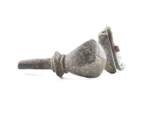 Antiquities - A 3rd / 4th Century roman fibula crossbow / trumpet brooch having a straight pin and spring coil. Measures appr