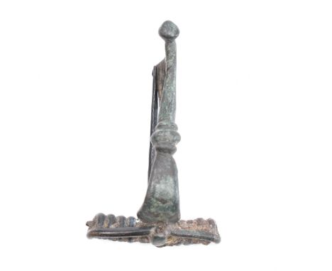 Antiquities - A 3rd / 4th Century roman fibula crossbow / trumpet brooch having a straight pin and spring coil (appears to be