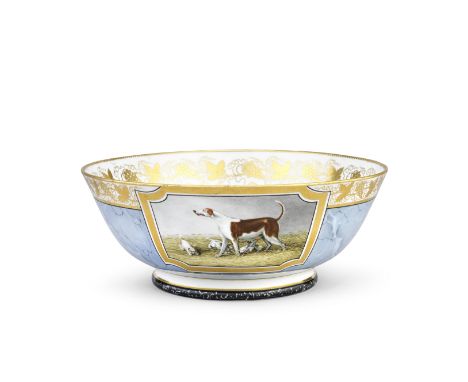 A Chamberlain Worcester punchbowl, circa 1810Painted with three large gilt-edged panels of sporting dogs, two lithe greyhound
