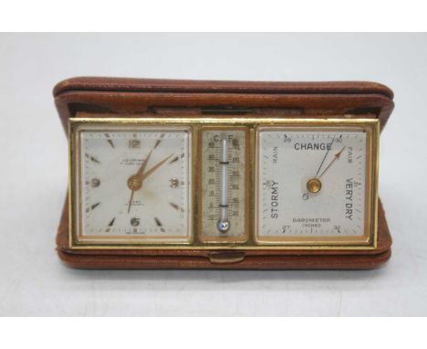 A vintage Looping 8-day travel clock, thermometer and barometer, 13cm 
