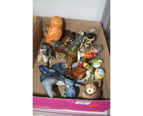 A collection of various bird figures to include Beswick etc